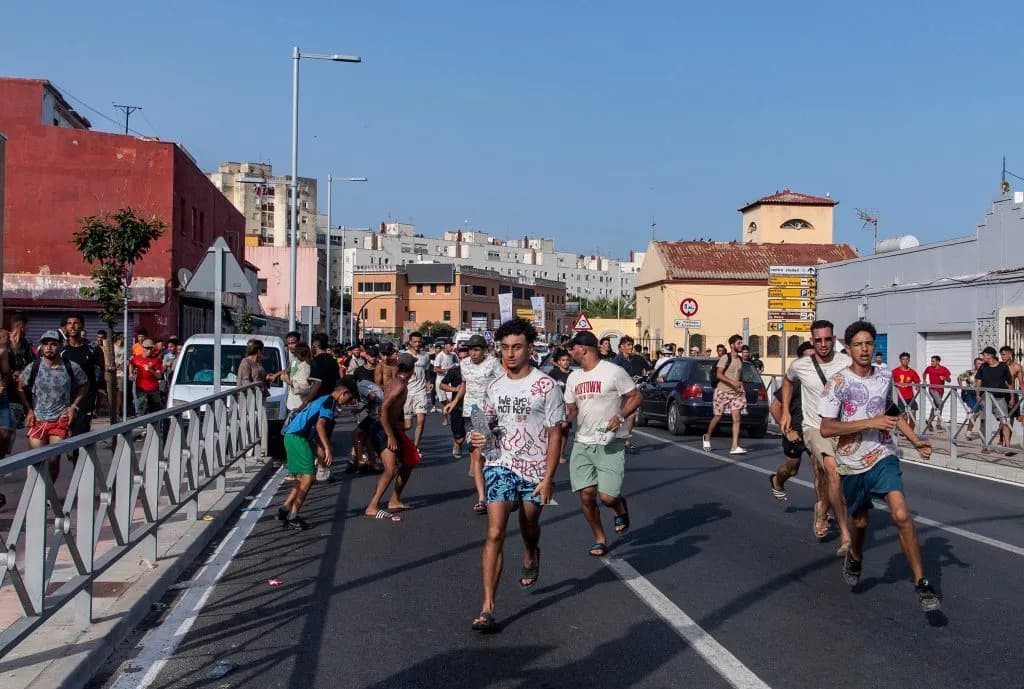 Spain Erects Sea Barrier in Ceuta After 60,000 Migrant Crossing