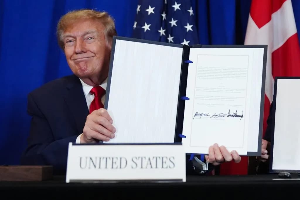 President Donald Trump signed a trilateral agreement with Denmark and Greenland on Tuesday