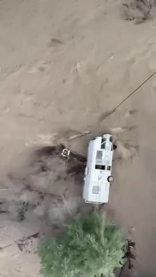 Guard Helicopter Rescues Family Trapped in Flipped RV